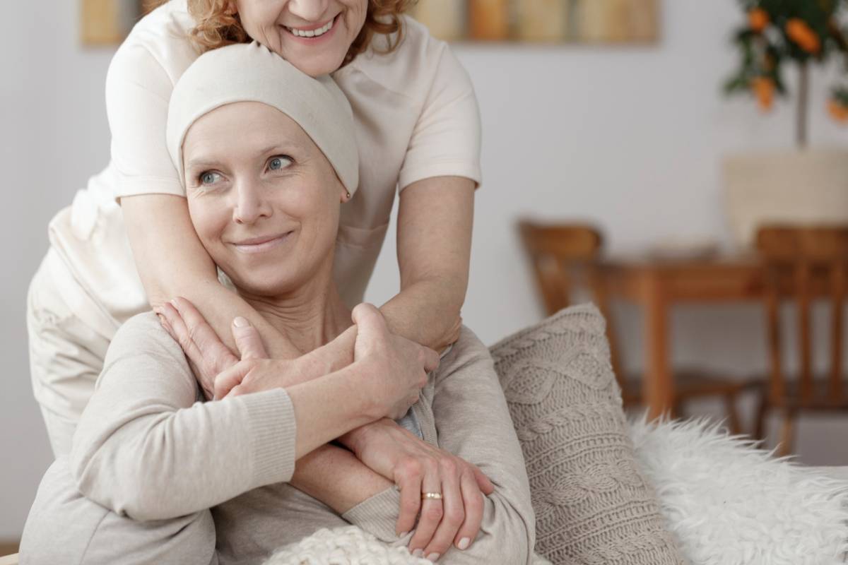 Mother helping a loved one during chemo